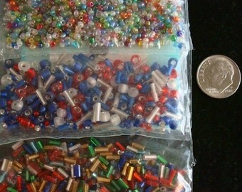 Hundreds of glass seed beads and bugle bead assortment 3 bags of beads gbs046