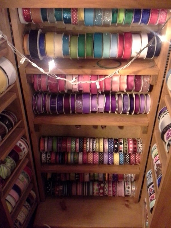 Ribbon storage door cabinet dowel rods upcycled by JaybeePepper