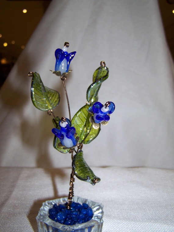 Handcrafted beaded wire flowers sculpture.