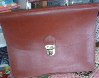 Old and beautiful Pack of teacher or student in leather.