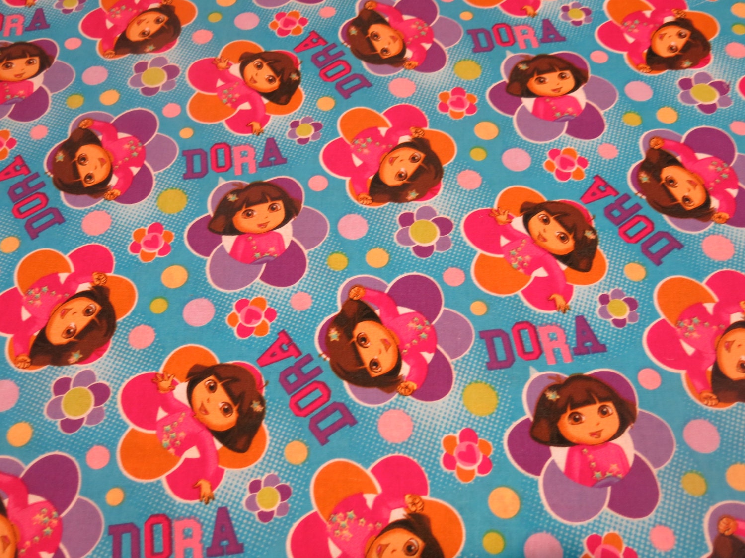 1/2 yard of 100 cotton Dora the Explorer Fabric