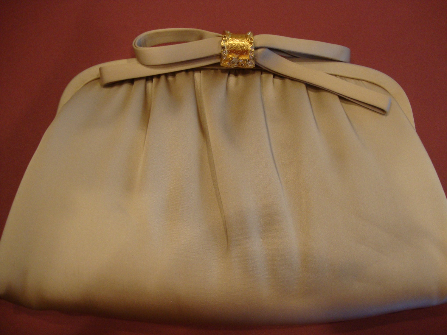 gold satin evening bag