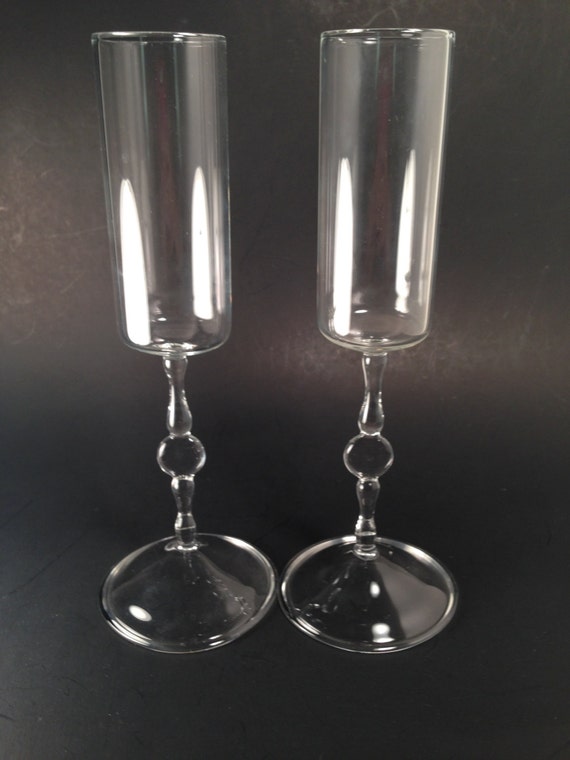 Fancy champagne flutes by the late Buddy Clark. by JABGLASSART