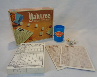 vintage 70s yahtzee game with numerous score cards