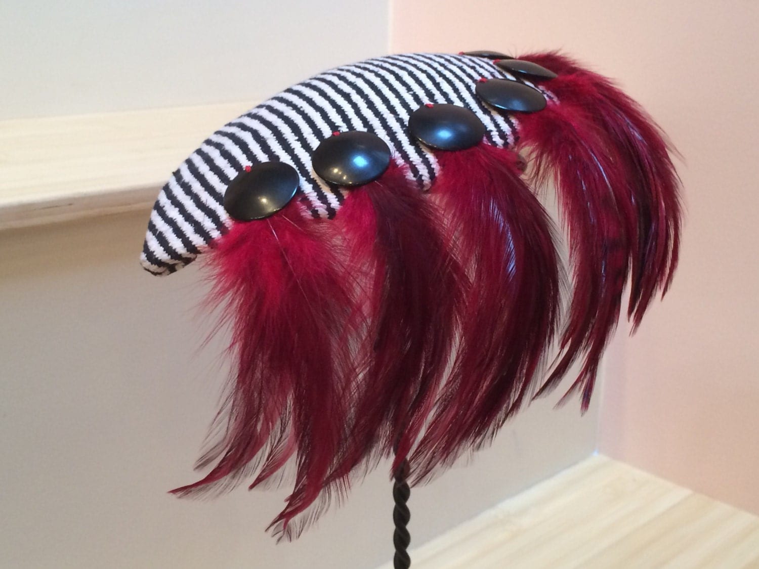 Black and White striped Fascinator Hat with deep Red feather