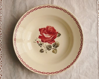 FORMER French earthenware deep plate