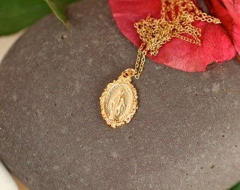Virgin mary necklace // religious necklace // layering necklace // a 22k gold vermeil virgin mary hanging from a 14k gold vermeil chain