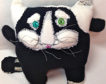 stuffed animal cat black and white