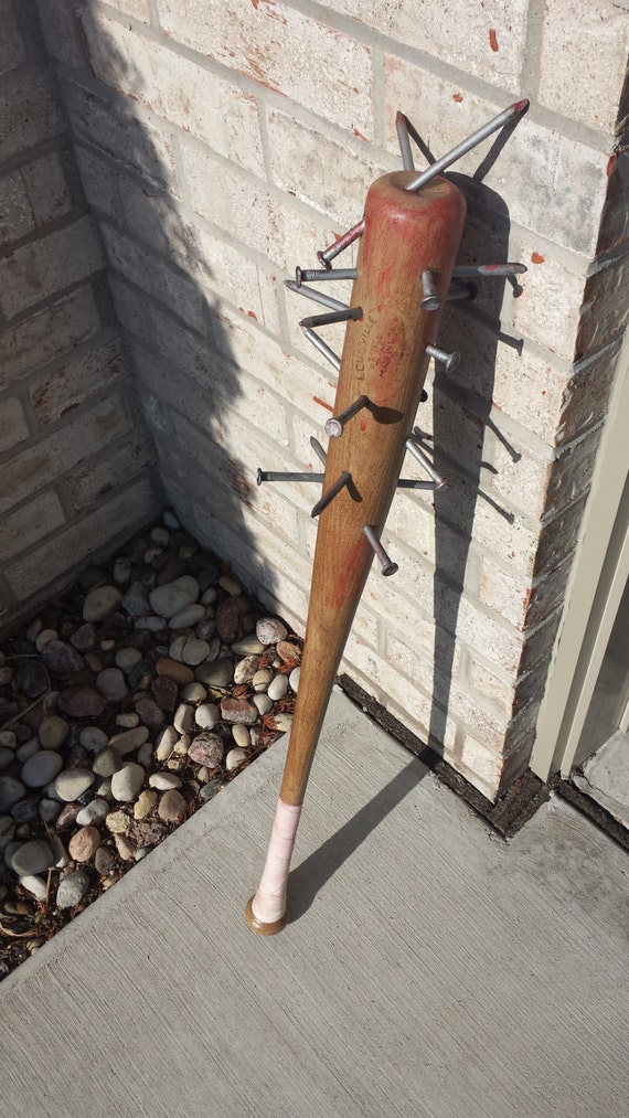 10 Point Slugger Plastic Prop Nail Embedded Baseball Bat