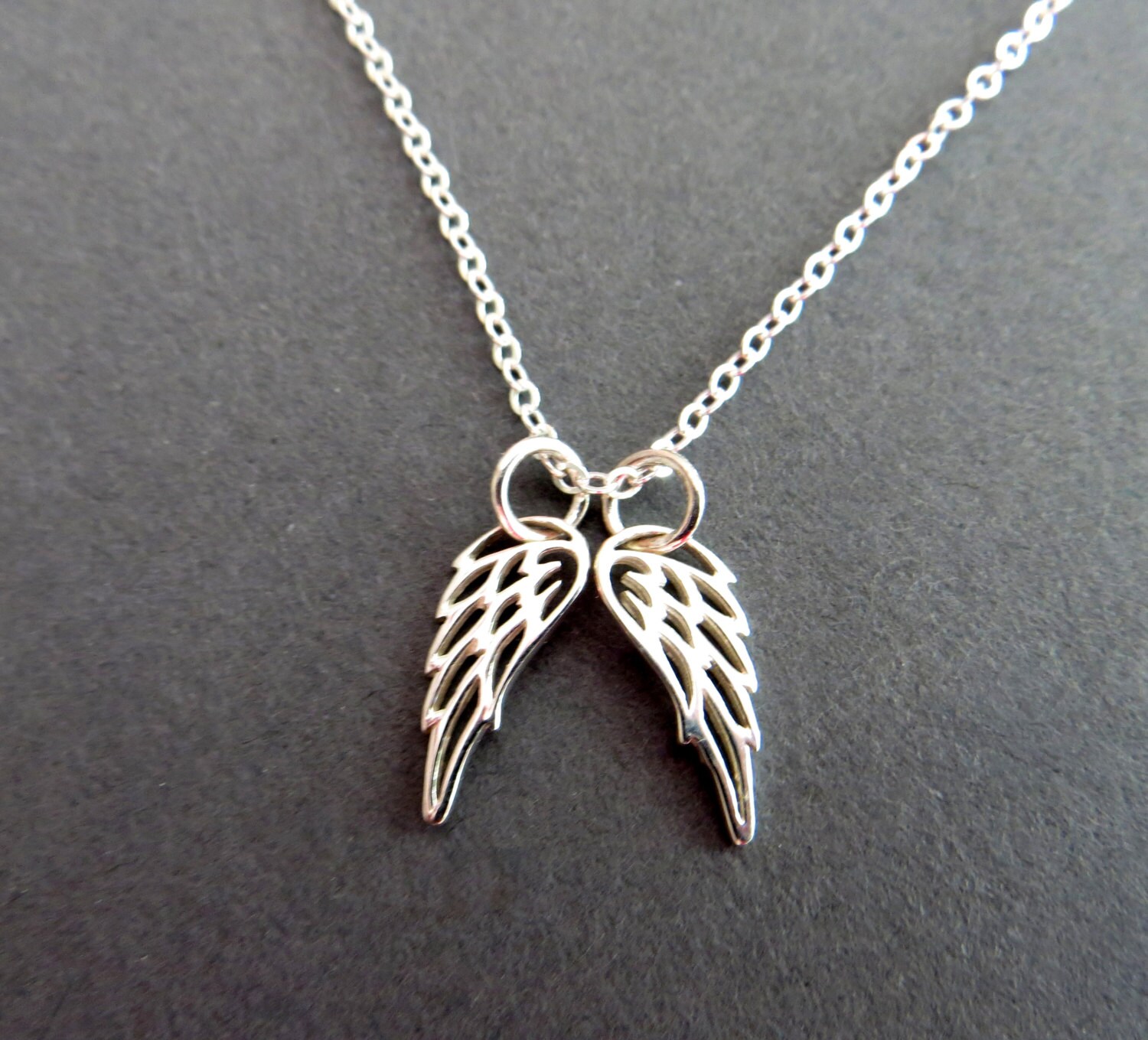 Tiny Double Angel Wing Necklace. Sterling Silver Angel Wing