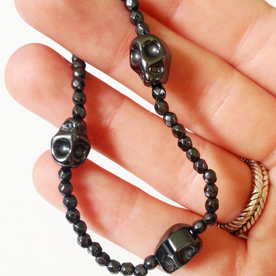 Items similar to Stretchy Beaded Hematite Skull Bracelet on Etsy