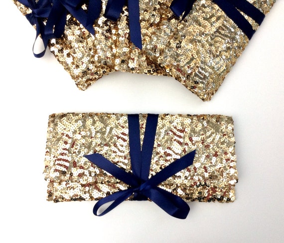 Bridesmaid clutches in gold sequins with navy bow Six 6 Sparkle ...