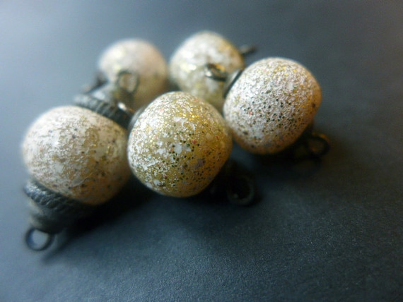 Bit o' Glam. 5 white polymer beads links with gold glitter speckles and oxidized brass mini caps.