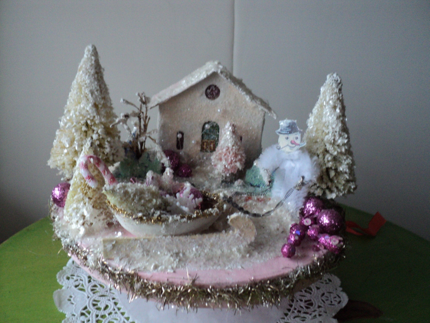 Snowy Christmas house with snowman