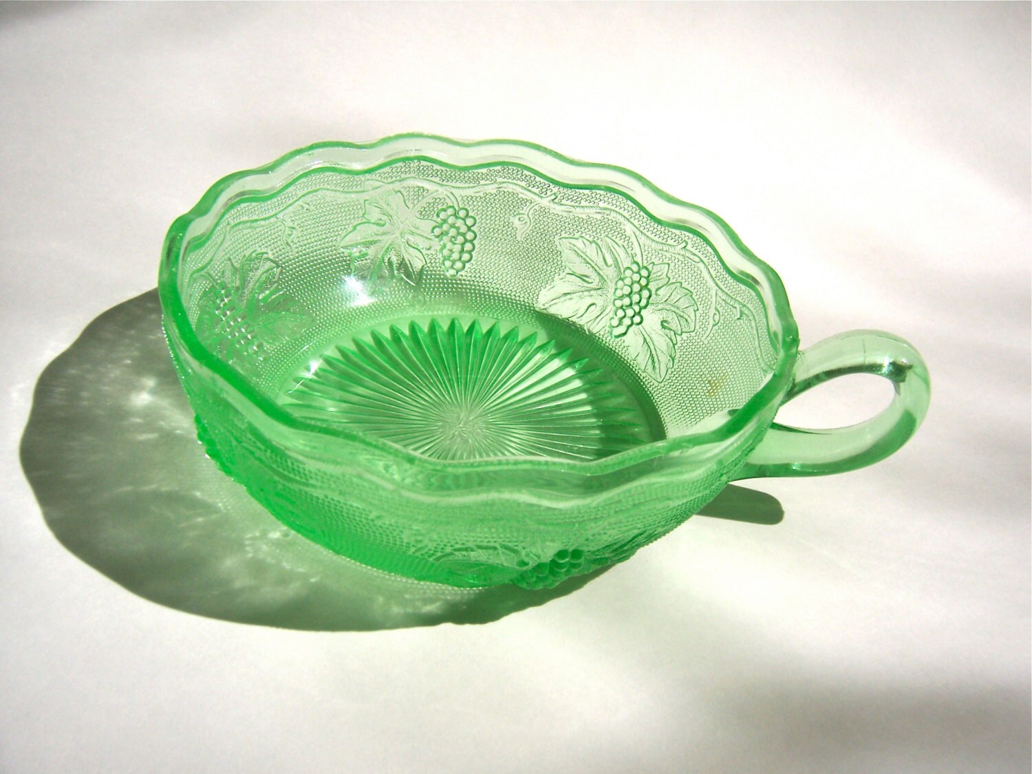 Green pressed glass dish grape vine pattern serving handle