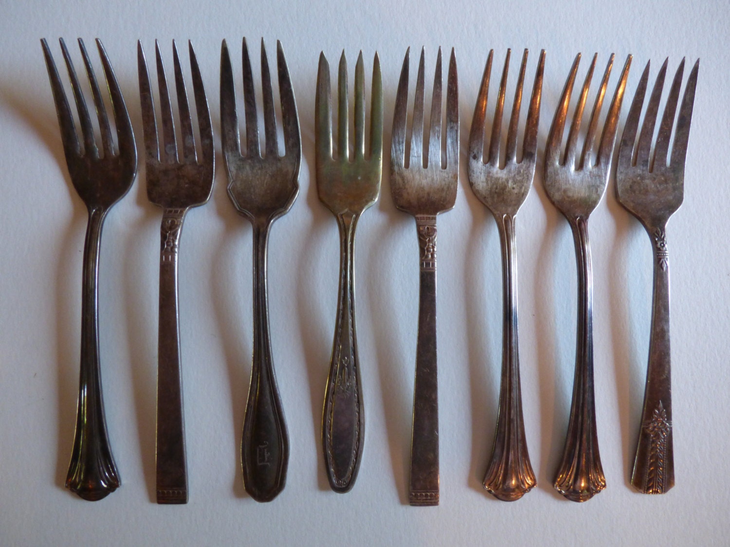 8 Mismatched Antique Dessert or Salad Forks 8 of them Haute Juice