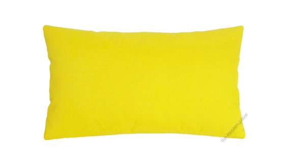 soft yellow decorative pillows