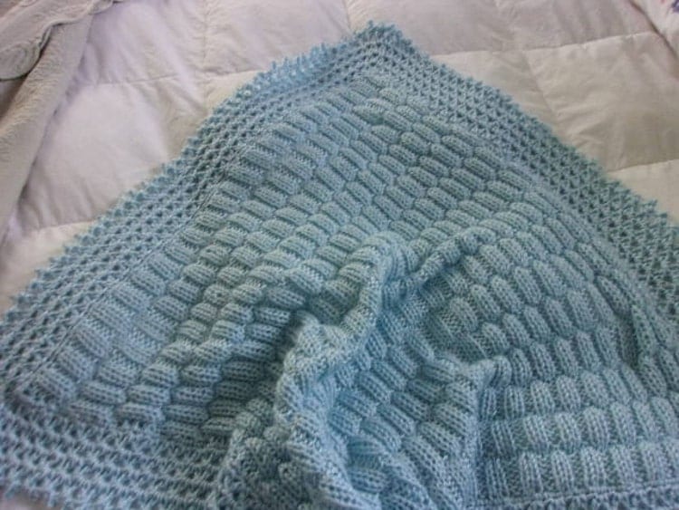 Hand Knit Baby Blanket in a staggered rib stitch by DarellaBaby