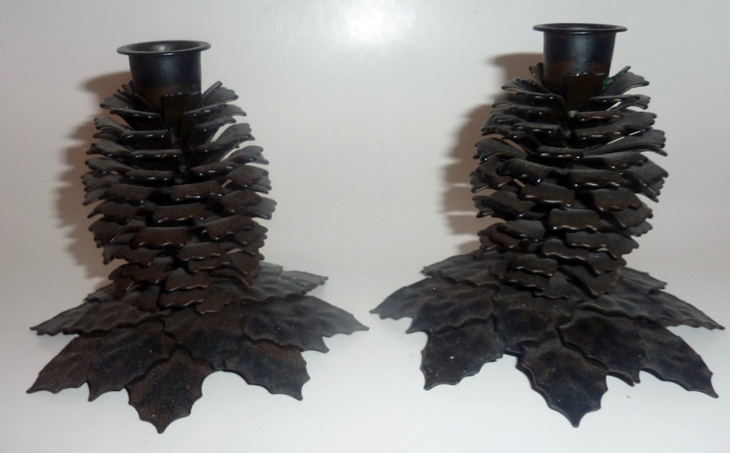 vintage metal pair of pine cone candle holders by tarquinantique