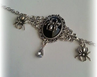 Spin bracelet with cabochon and rhinestone