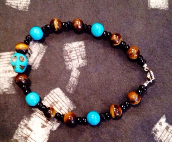 The rock and roll skull men's bracelet by BoutiqueBee on Etsy