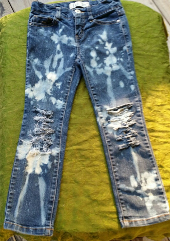 distressed jeans with chains