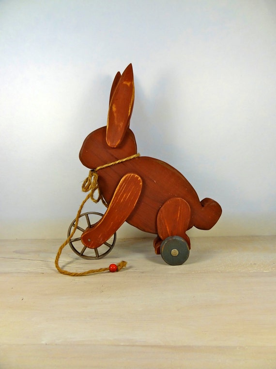 Items similar to Handmade Wooden Red Rabbit on Wheels Toy Display Home