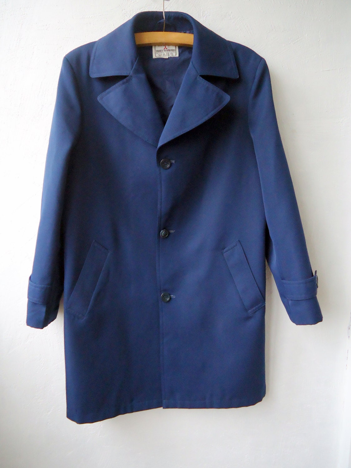Navy blue trench coat edit Tell us where you are located and we can tell you what's available.