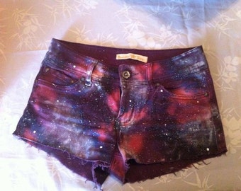 Handmade clothing with galaxy and nebula design such as shorts, shirts ...