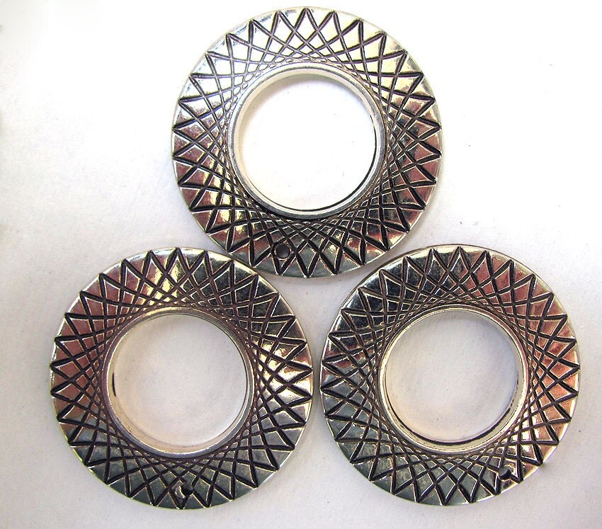 Embossed Circle Pendants from ladykjewels on Etsy Studio