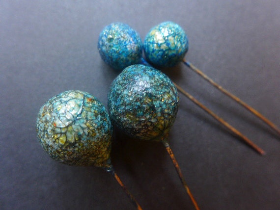 Crusty Crackle Pins. 4 lollipop polymer clay artisan head pins in blue with gold glitter shards.