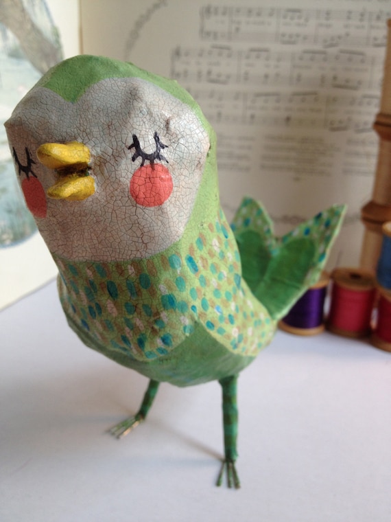 Adorable little green paper mache bird
