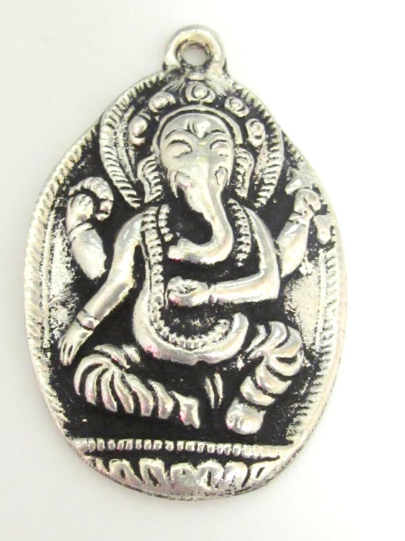 Antiqued silver color Oval shape Ganesha pendant from Nepal