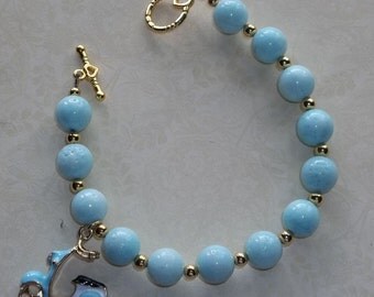 Light blue/Aqua Beaded Coral Necklace with Scooter charm