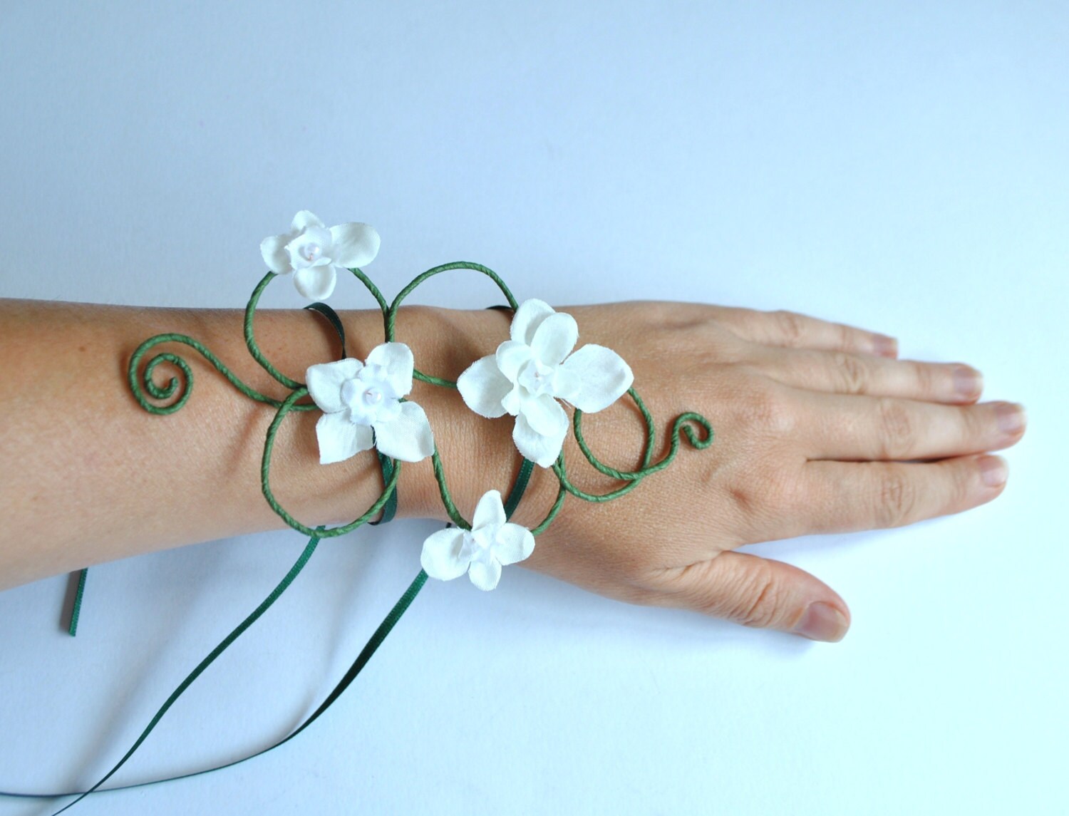 Arm cuff bracelet corsage pretty white flowers and green vine