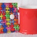 Quilted Tea Wallet in a Jig Saw Pattern Fabric - Teacher Gift with Cute Bright Stripe Fabric with White Button with Elastic Loop to Close