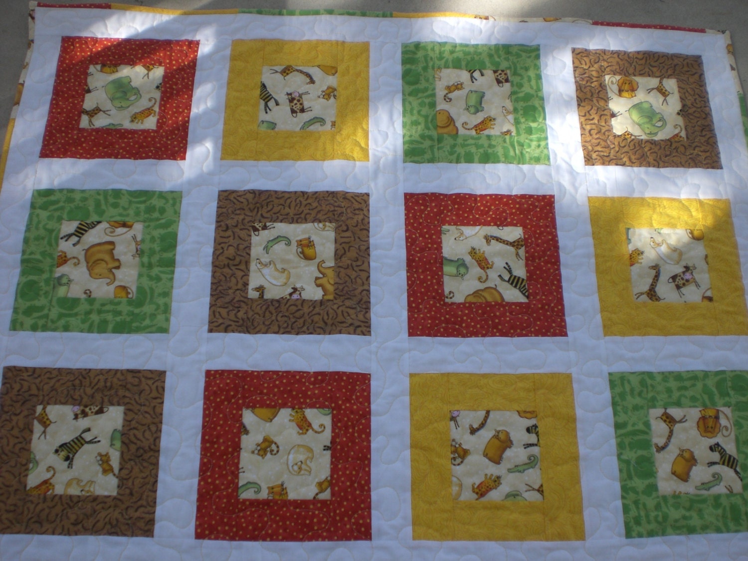 Baby quilt with zoo animals by KeyLimeDesignByJeana on Etsy