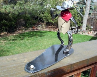 cowboy golfer sculpture