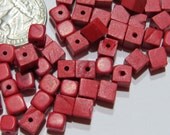 Square wood beads.  Red beads. Square beads. Wood beads.  Red square beads.  Red wood beads.