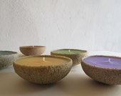 Five colored sand candles.