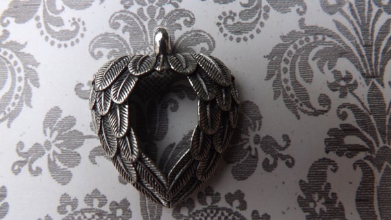 Wing Charm, cherub , angel , steampunk , guardian , feathered,heart charm , silver charm , angel charm by JewelleryQuarter steampunk buy now online
