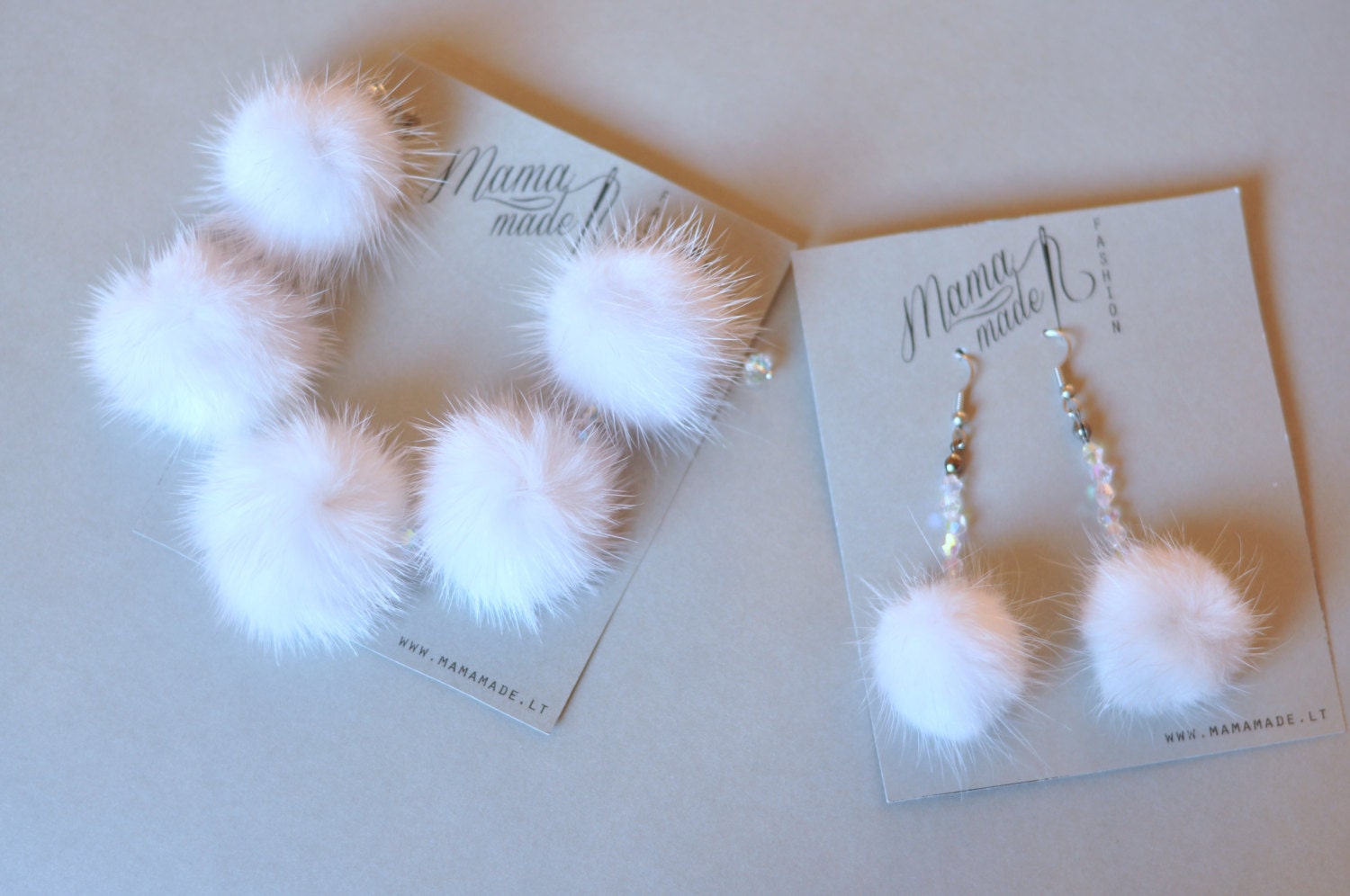 Set of white mink fur earrings and bracelet