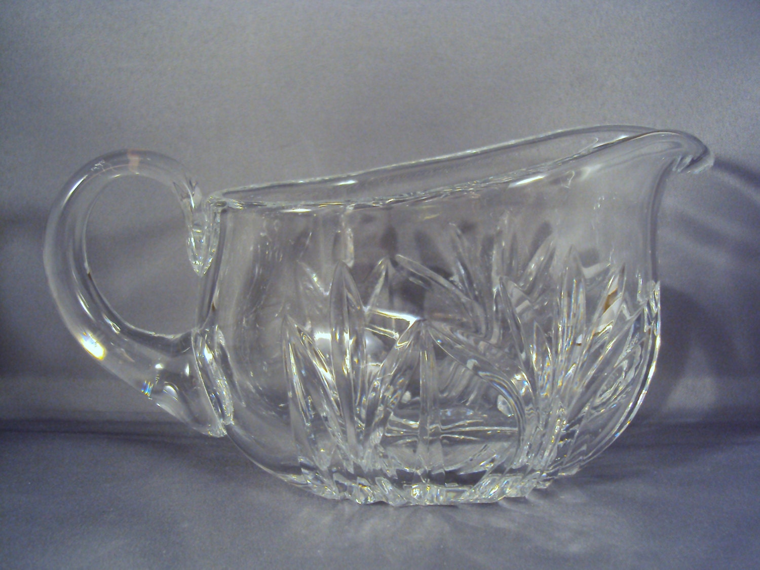 A beautiful cut crystal gravy boat Haute Juice