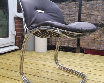 A set of four wired Italian vintage chairs by Gastone Rinaldi