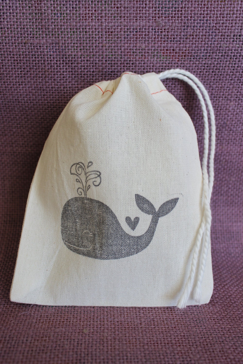Small muslin bag with black whale design. 4x6 muslin sack