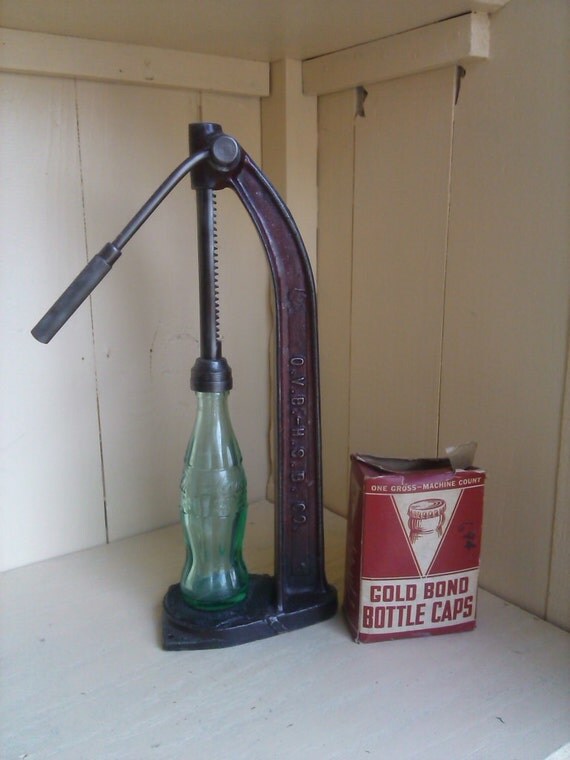 Items similar to Antique Cast Iron Bottle Capper with Bottle and Caps