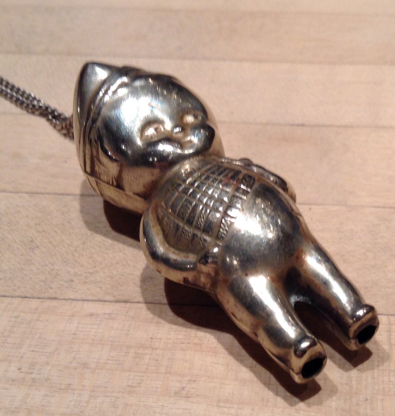 Antique Silver Kewpie doll rattle necklace