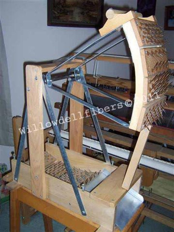 Here are plans for building a wool picker. It is sturdy and