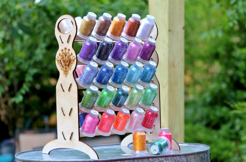 Embroidery thread organizer holds 50 spools vertically taking Embroidery thread organizer holds 50 spools vertically taking