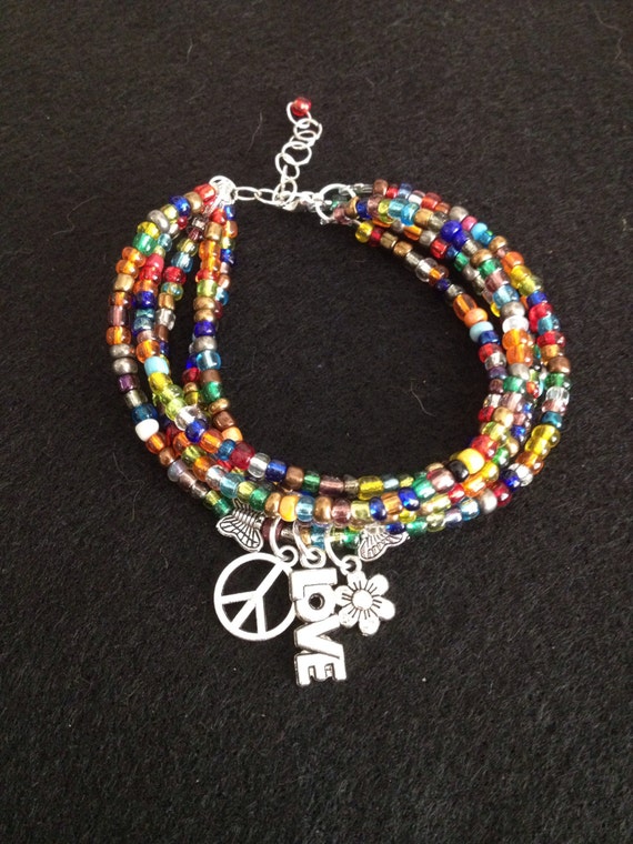Items similar to Peace & Love hippy bracelet on Etsy